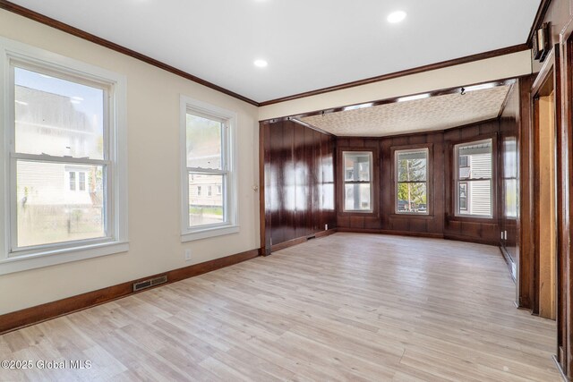 5 Barney St, Schenectady, NY 12307 - unfurnished room featuring crown molding, recessed lighting, baseboards, and light wood-style flooring