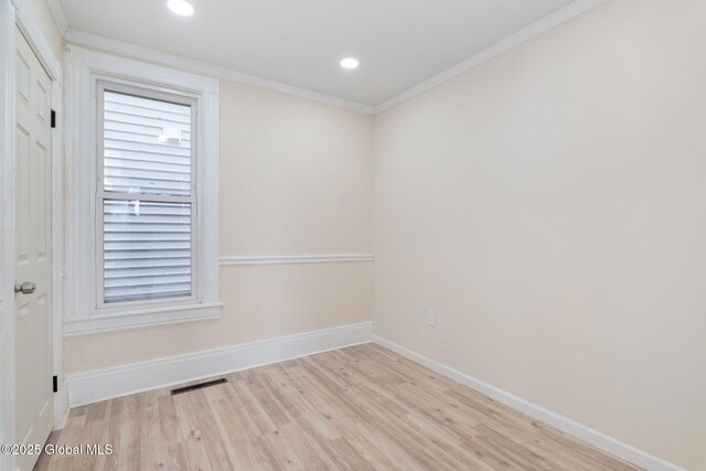 5 Barney St, Schenectady, NY 12307 - unfurnished room featuring visible vents, crown molding, wood finished floors, baseboards, and recessed lighting