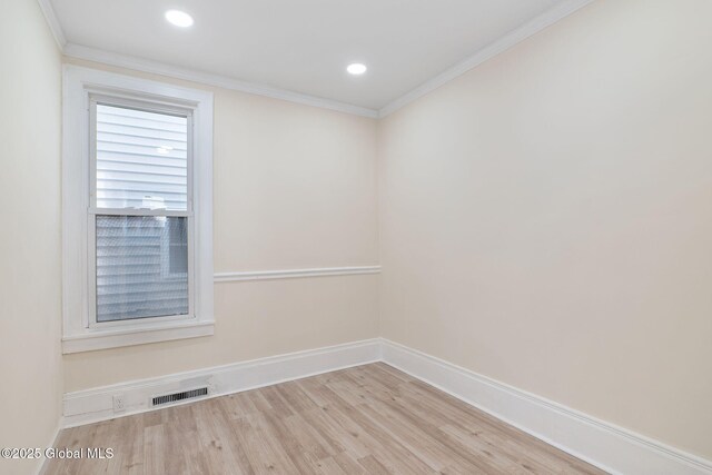 5 Barney St, Schenectady, NY 12307 - spare room featuring visible vents, crown molding, wood finished floors, baseboards, and recessed lighting
