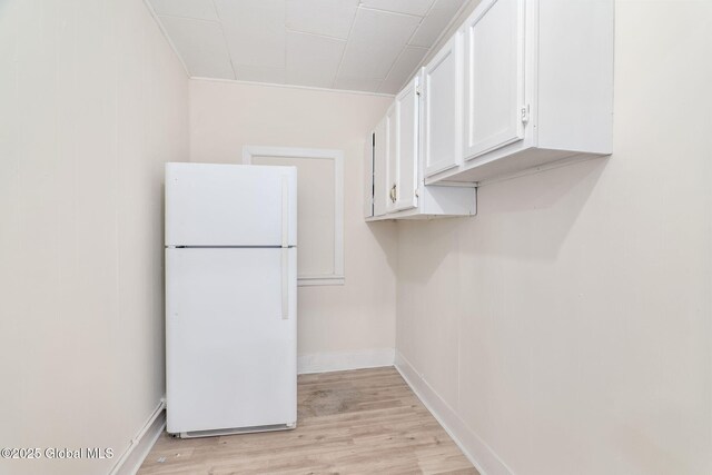 5 Barney St, Schenectady, NY 12307 - clothes washing area featuring baseboards and light wood-style flooring