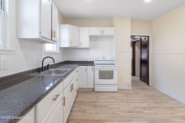 5 Barney St, Schenectady, NY 12307 - kitchen featuring white cabinets, tasteful backsplash, a sink, white electric stove, and light wood finished floors