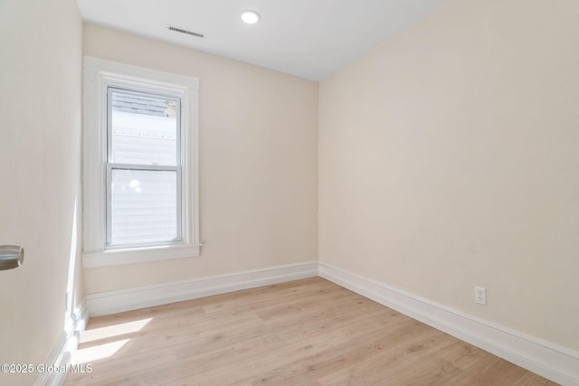 5 Barney St, Schenectady, NY 12307 - spare room featuring a healthy amount of sunlight, baseboards, light wood-type flooring, and visible vents