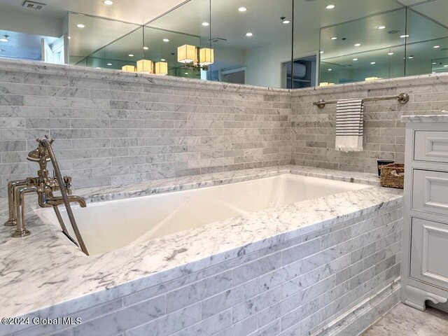 5A6 Sagamore Rd, Bolton, NY 12814 - bathroom with recessed lighting, visible vents, and a bathtub