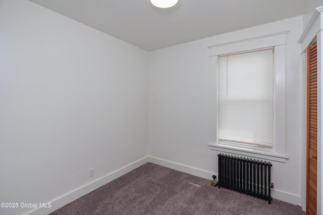 1538 Nott St, Schenectady, NY 12308 - spare room featuring radiator, carpet floors, and baseboards
