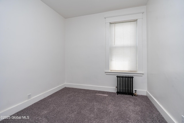 1538 Nott St, Schenectady, NY 12308 - spare room featuring radiator, carpet, and baseboards
