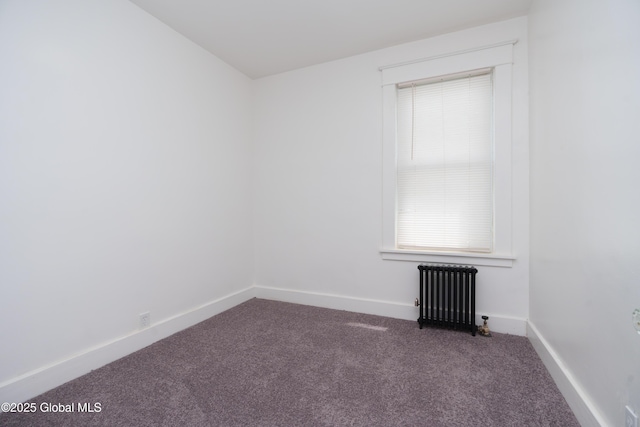 1538 Nott St, Schenectady, NY 12308 - spare room featuring radiator, carpet, and baseboards