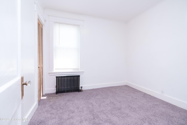 1538 Nott St, Schenectady, NY 12308 - carpeted empty room featuring radiator heating unit, ornamental molding, and baseboards