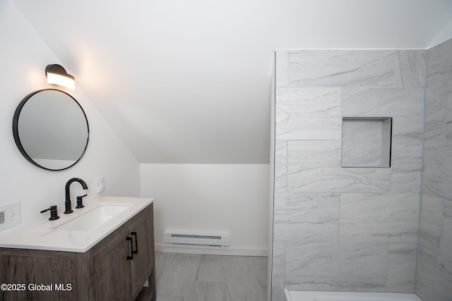 1538 Nott St, Schenectady, NY 12308 - bathroom featuring a baseboard radiator, marble look tiles, vanity, and lofted ceiling