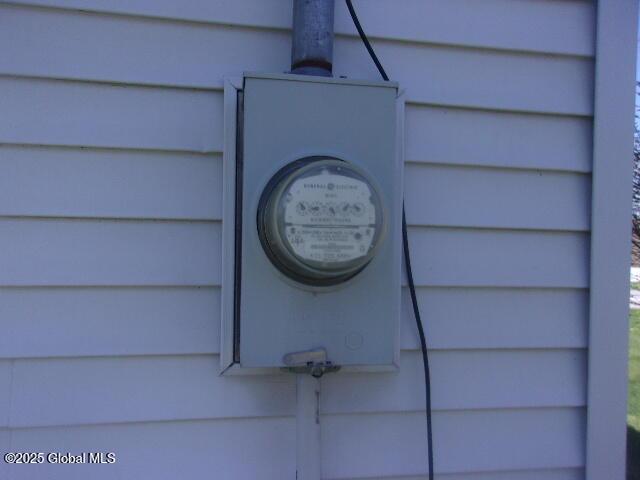 exterior details featuring electric meter