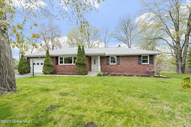 single story home with an attached garage, brick siding, driveway, and a front yard