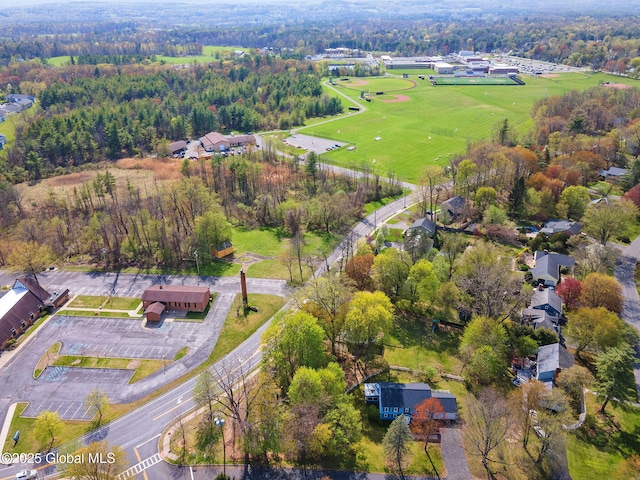 aerial view featuring a forest view