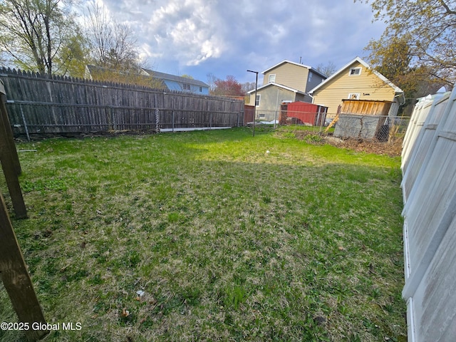 view of yard featuring a fenced backyard