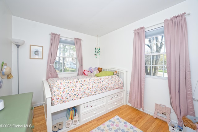 bedroom featuring light wood-type flooring