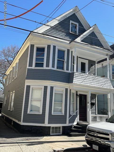 18 Ingersoll Ave, Schenectady, NY 12305 - view of front of property with a balcony and covered porch