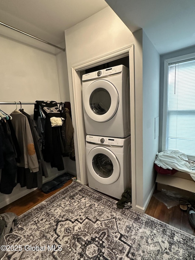 18 Ingersoll Ave, Schenectady, NY 12305 - laundry area featuring stacked washer and dryer, laundry area, and wood finished floors