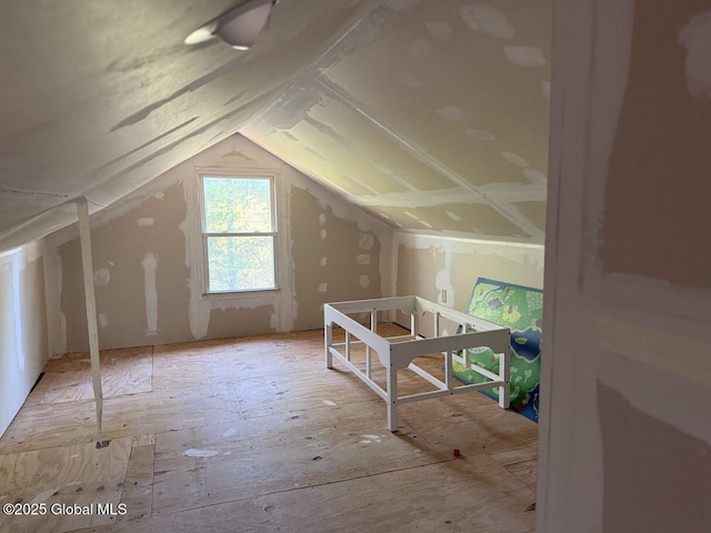 bonus room with vaulted ceiling