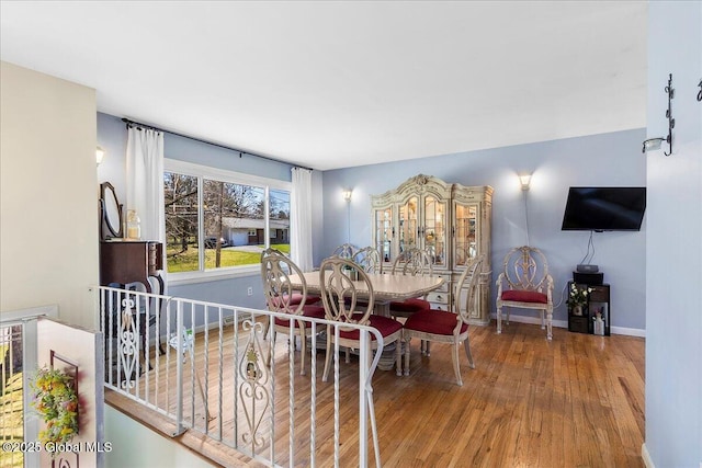 67 Fairlawn Dr, Colonie, NY 12110 - dining room featuring wood finished floors and baseboards