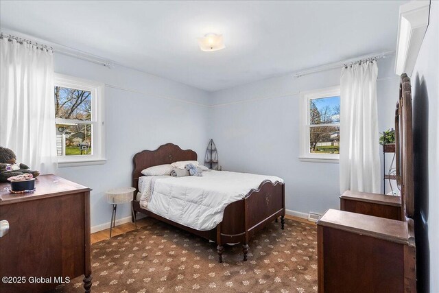 67 Fairlawn Dr, Colonie, NY 12110 - bedroom featuring wood finished floors and baseboards