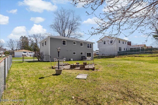 67 Fairlawn Dr, Colonie, NY 12110 - back of property with a fire pit
