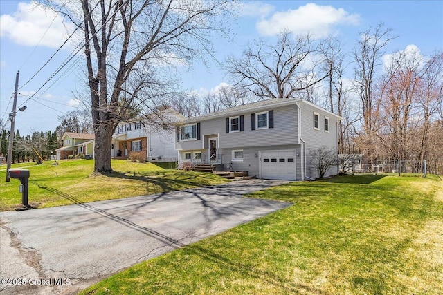 67 Fairlawn Dr, Colonie, NY 12110 - raised ranch with driveway and a garage
