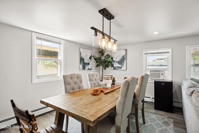 41 Madison St, Saratoga Springs, NY 12866 - dining space with wood finished floors, a baseboard heating unit, recessed lighting, and cooling unit