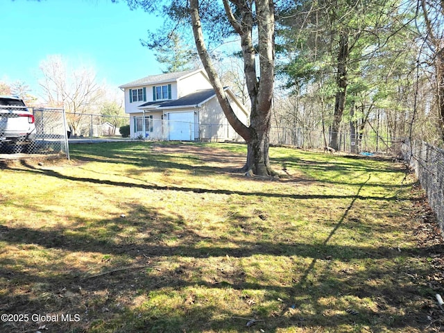 view of yard featuring a fenced backyard