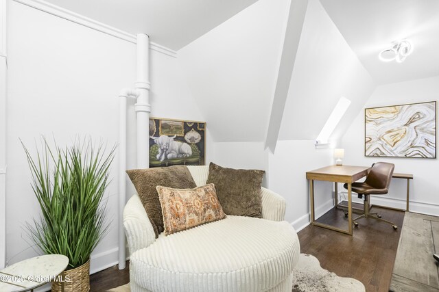 home office featuring baseboards, vaulted ceiling, and wood finished floors