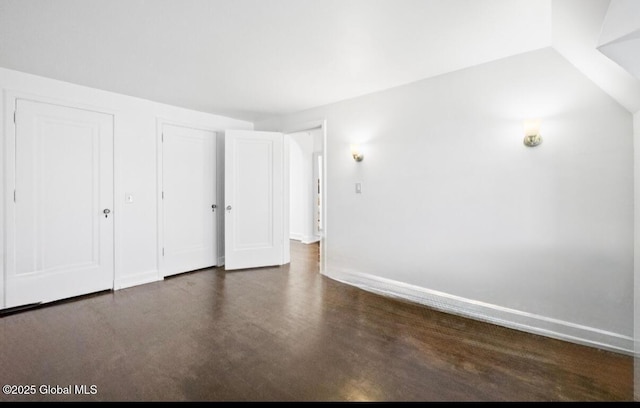 unfurnished bedroom featuring baseboards