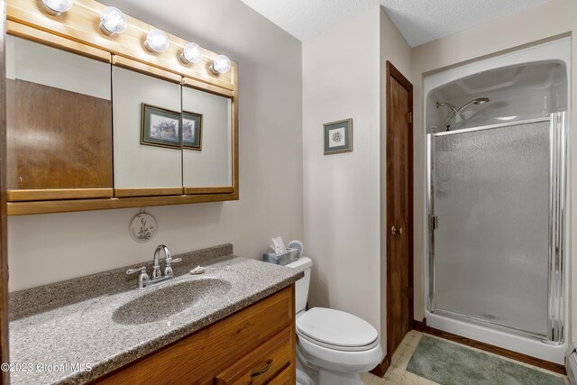373 County Route 42, Fort Edward, NY 12828 - bathroom featuring vanity, toilet, and a stall shower