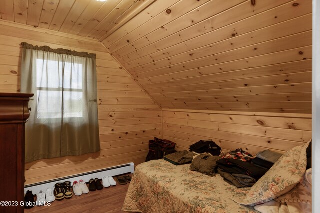373 County Route 42, Fort Edward, NY 12828 - bedroom with lofted ceiling, wood walls, wood ceiling, and wood finished floors
