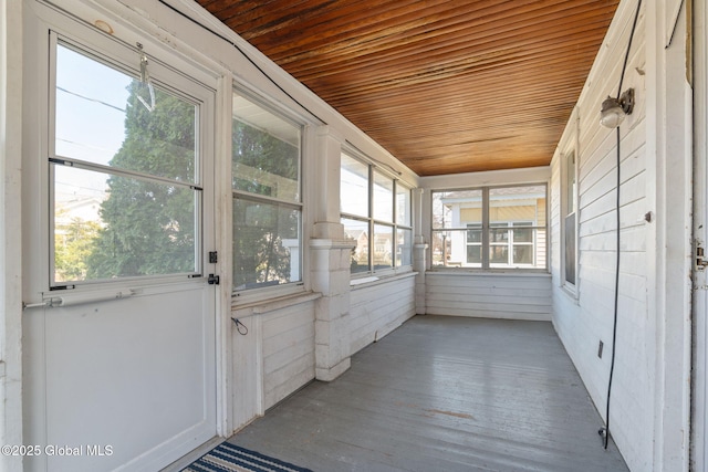 unfurnished sunroom with a wealth of natural light