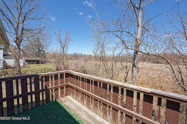 deck featuring a lawn
