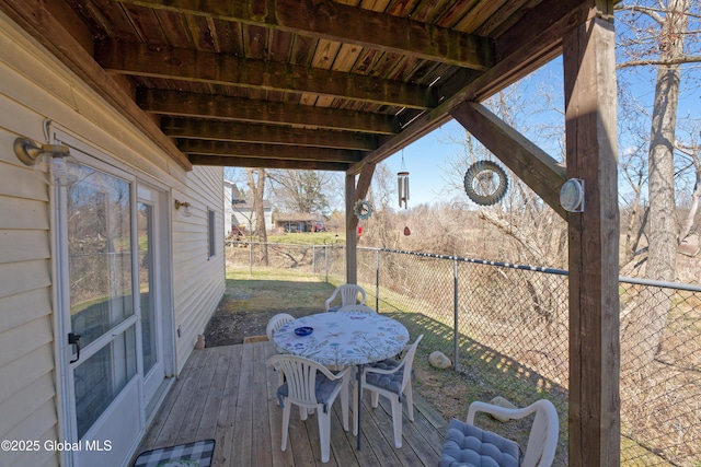 deck featuring fence and outdoor dining area