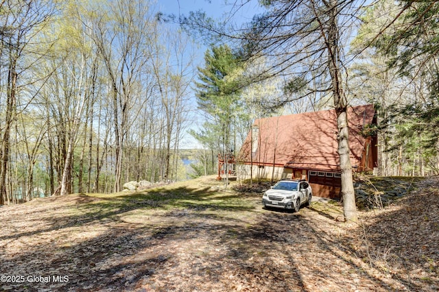 view of yard featuring an attached garage