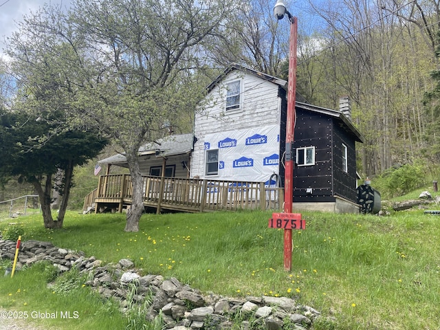 18751 State Route 22, Petersburgh, NY 12138 - view of front of home featuring a chimney and a wooden deck