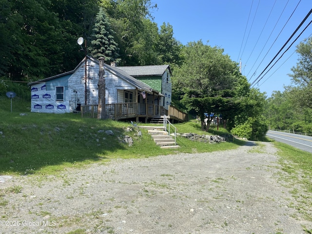 18751 State Route 22, Petersburgh, NY 12138 - view of side of home with a deck