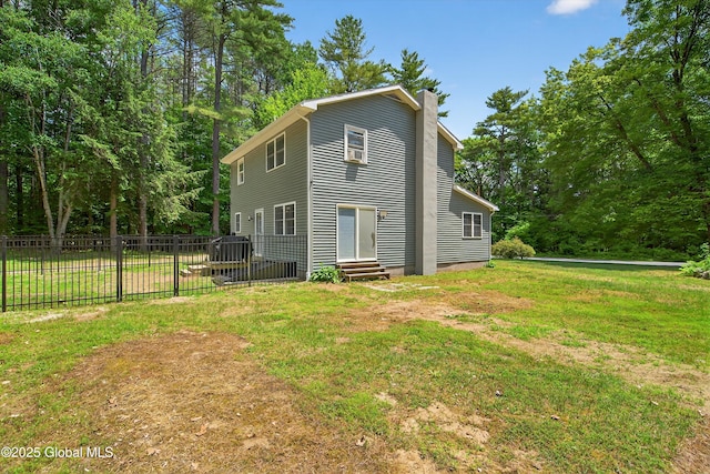 175 Library Ave, Warrensburg, NY 12885 - back of property featuring a chimney and entry steps