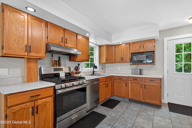 175 Library Ave, Warrensburg, NY 12885 - kitchen featuring appliances with stainless steel finishes, under cabinet range hood, plenty of natural light, light countertops, and recessed lighting