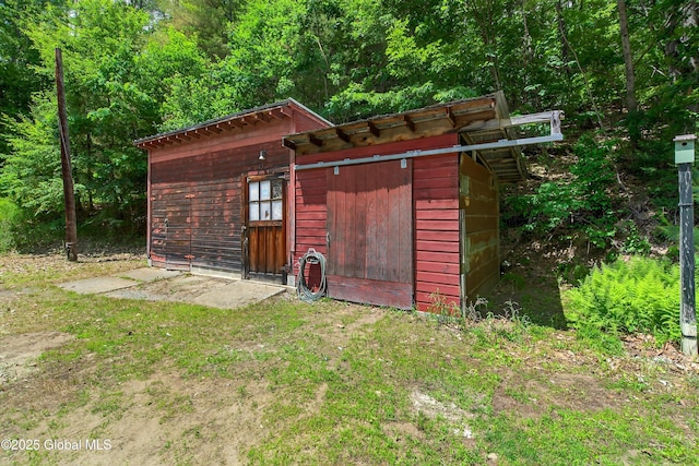 175 Library Ave, Warrensburg, NY 12885 - view of outbuilding featuring a wooded view
