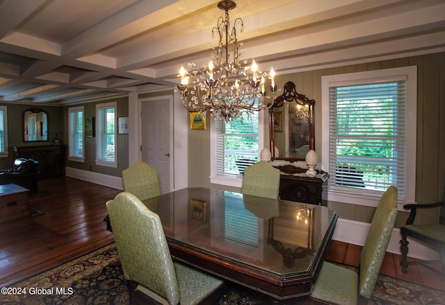 dining room featuring a wealth of natural light, a chandelier, hardwood / wood-style floors, and beamed ceiling