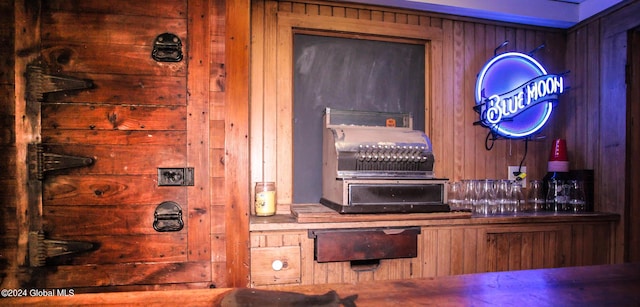 interior space featuring wood walls