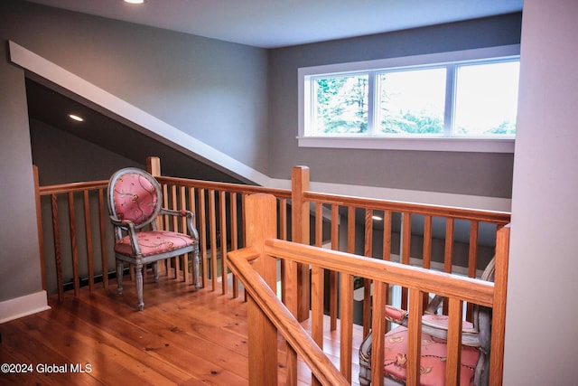 stairs featuring recessed lighting and hardwood / wood-style flooring