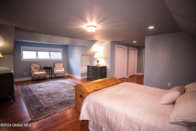 bedroom with recessed lighting, baseboards, and wood finished floors