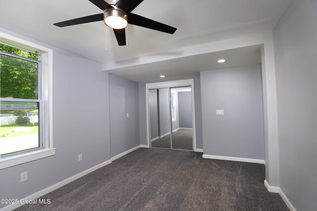 701 Engleman Ave, Glenville, NY 12302 - unfurnished bedroom with dark colored carpet, a closet, baseboards, recessed lighting, and ceiling fan