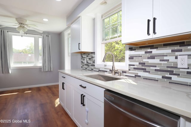 701 Engleman Ave, Glenville, NY 12302 - kitchen featuring stainless steel dishwasher, a sink, dark wood finished floors, ceiling fan, and white cabinetry
