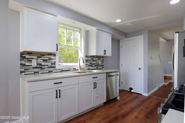 701 Engleman Ave, Glenville, NY 12302 - kitchen featuring appliances with stainless steel finishes, a sink, recessed lighting, decorative backsplash, and light countertops