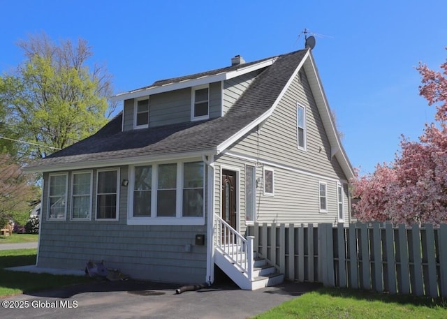 701 Engleman Ave, Glenville, NY 12302 - bungalow-style house featuring a chimney, fence, a shingled roof, and entry steps