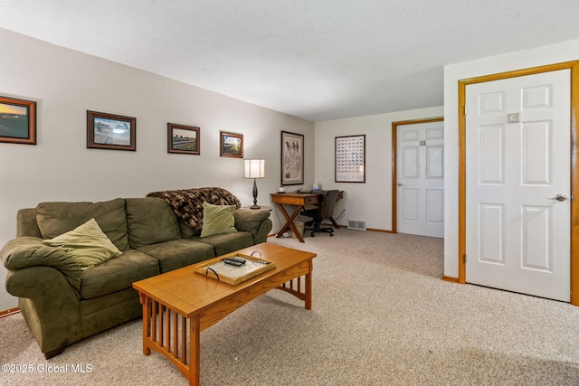living room featuring baseboards, light colored carpet, and visible vents