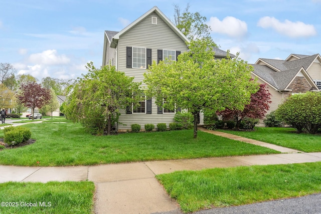 view of front of home with a front yard