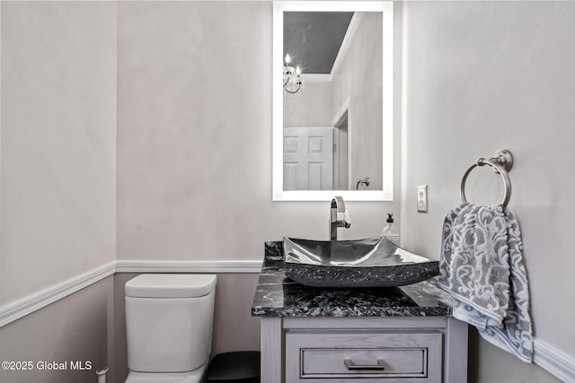 half bath with toilet and vanity